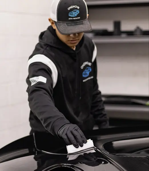 Daniel Pasillas, owner of ONDMOVE Auto, working on a vehicle