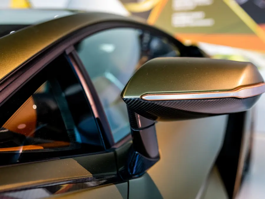 Color-shift vinyl wrap finish across a mirror and door